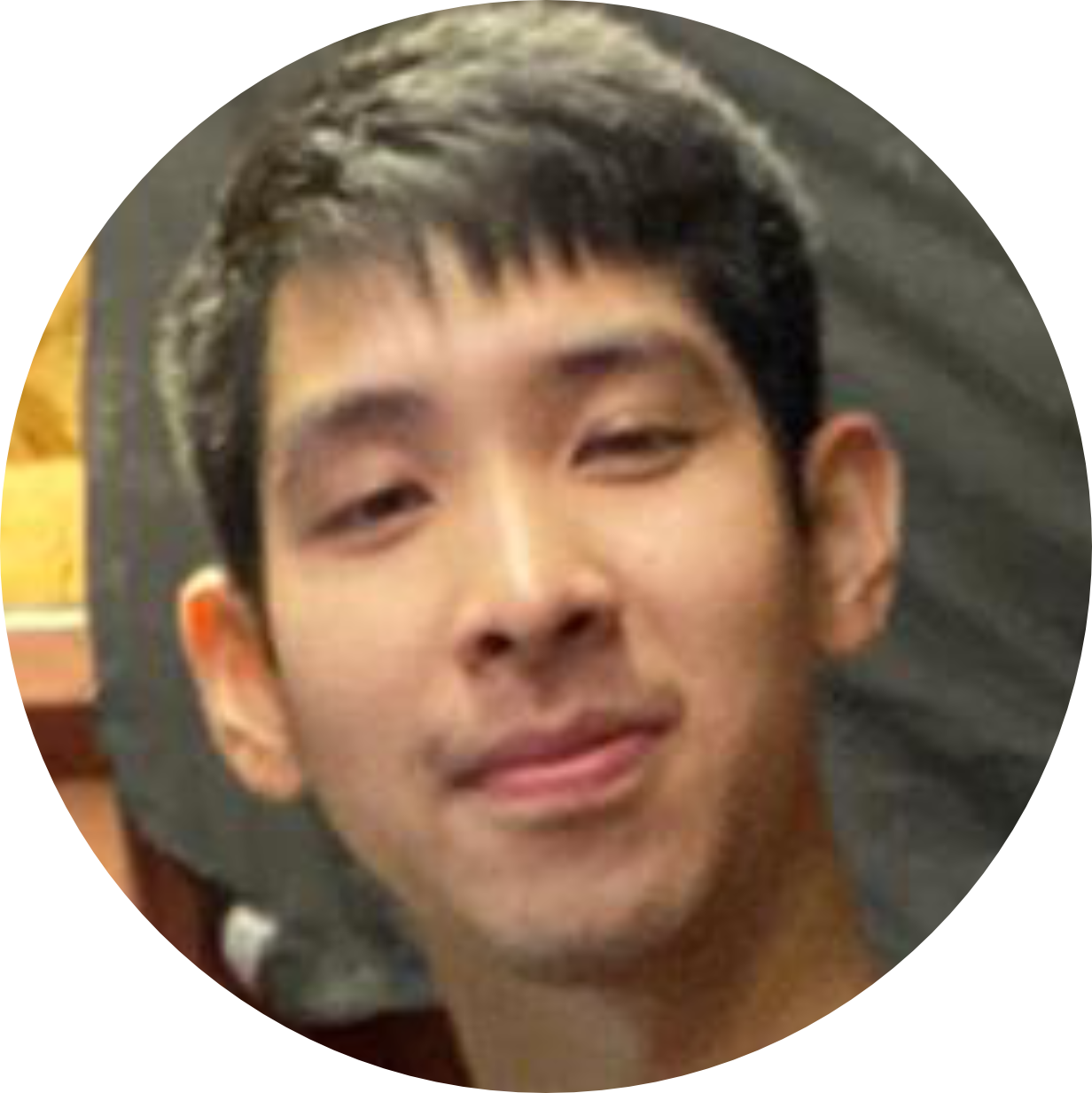 German player Minh Quan Chu smiling in a headshot portrait during private training via Universal Table Tennis.